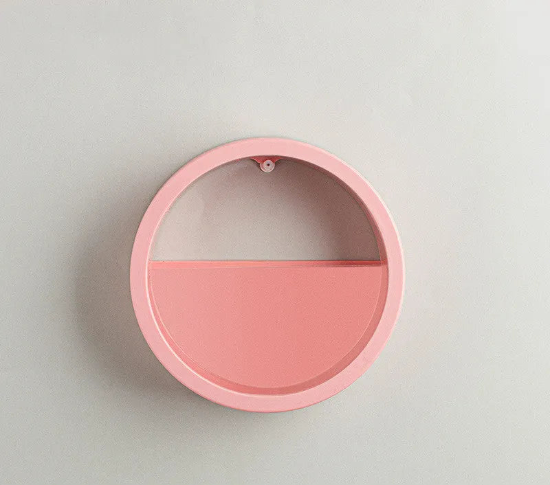 Round iron style plastic wall vase hanging basket for flowers in multiple colour options.