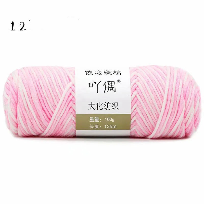 Eight strands of gradient milk cotton wool in a ball, showing multiple colour options for hand knitting.
