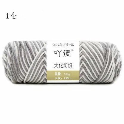 Eight strands of gradient milk cotton wool in a ball, showing multiple colour options for hand knitting.