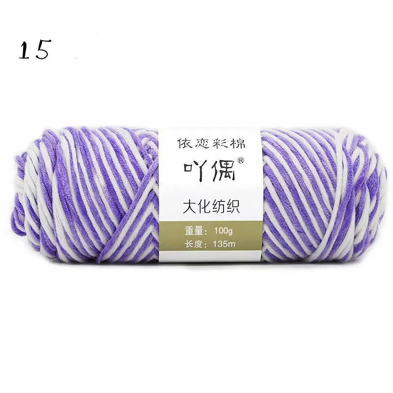 Eight strands of gradient milk cotton wool in a ball, showing multiple colour options for hand knitting.
