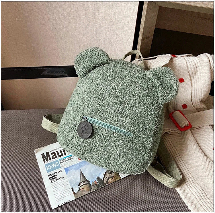 Adorable bear-shaped backpack made of soft, fleece material for kids and women's travel and everyday use