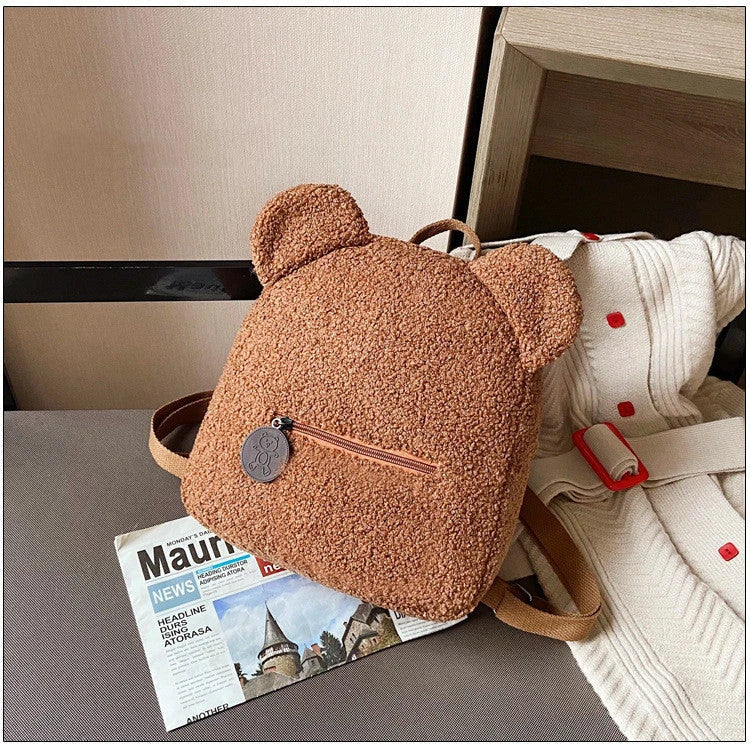 Adorable bear-shaped backpack made of soft, fleece material for kids and women's travel and everyday use