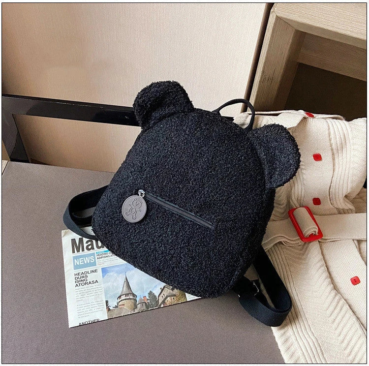 Adorable bear-shaped backpack made of soft, fleece material for kids and women's travel and everyday use