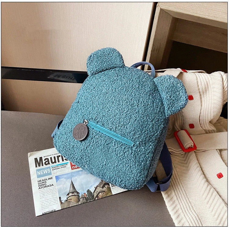 Adorable bear-shaped backpack made of soft, fleece material for kids and women's travel and everyday use
