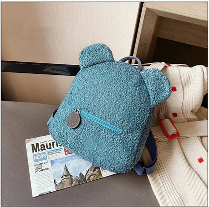 Adorable bear-shaped backpack made of soft, fleece material for kids and women's travel and everyday use