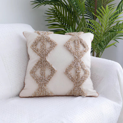 Tufted throw pillow with Moroccan fringe in 45cm square size with decorative tufting pattern