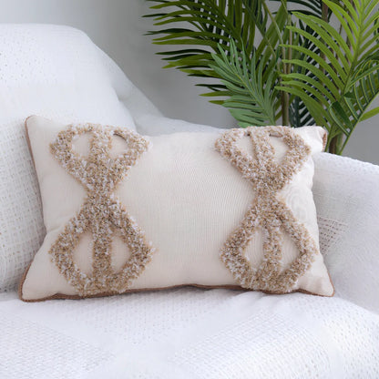 Tufted throw pillow with Moroccan fringe in 45cm square size with decorative tufting pattern