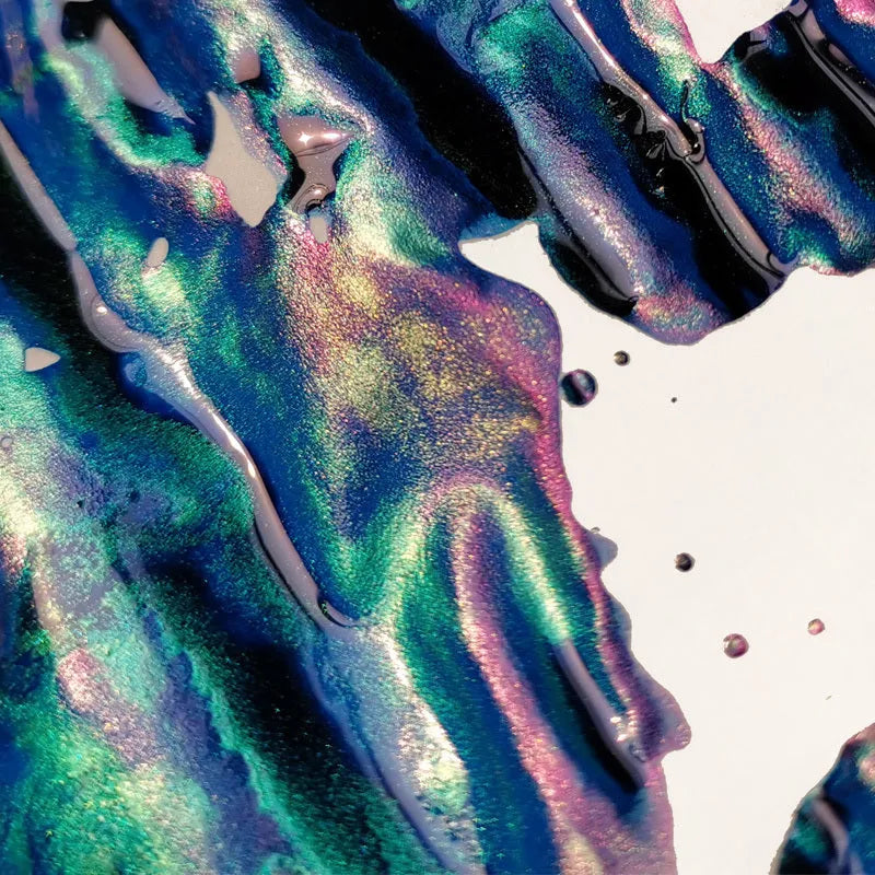 Bottle of MEMORY-0420 sheen gradient fountain pen ink in gold powder colour.