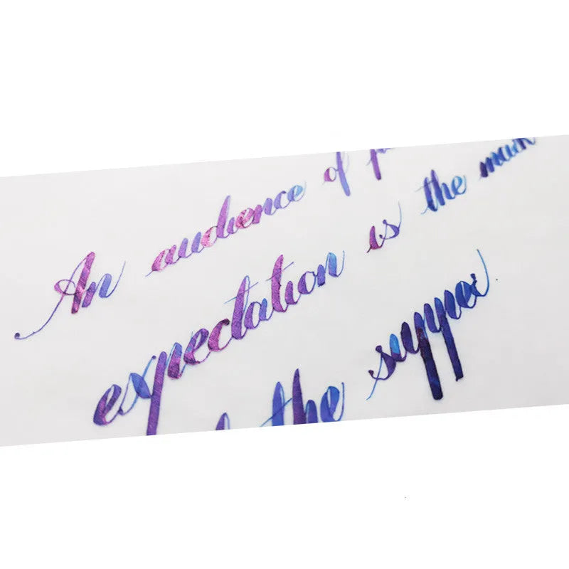 Bottle of MEMORY-0420 sheen gradient fountain pen ink in gold powder colour.