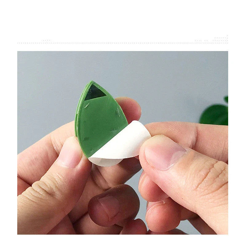 Decorative plant wall clips made of eco-friendly ABS resin in a leaf shape, providing an easy solution for supporting climbing indoor and outdoor plants