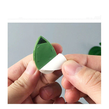 Decorative plant wall clips made of eco-friendly ABS resin in a leaf shape, providing an easy solution for supporting climbing indoor and outdoor plants