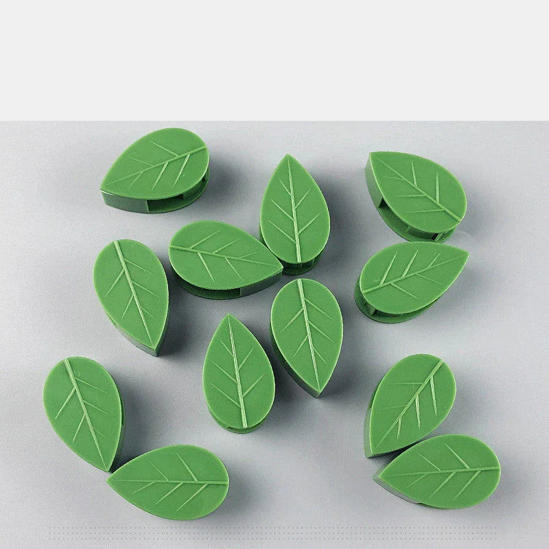 Decorative plant wall clips made of eco-friendly ABS resin in a leaf shape, providing an easy solution for supporting climbing indoor and outdoor plants