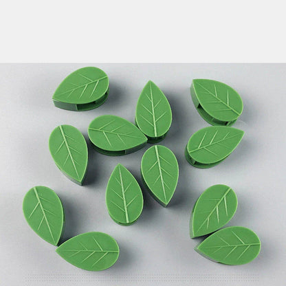 Decorative plant wall clips made of eco-friendly ABS resin in a leaf shape, providing an easy solution for supporting climbing indoor and outdoor plants