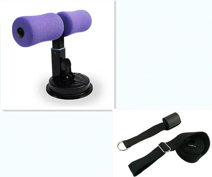 Compact sit-up strength trainer with steel springs and foam padding for home fitness