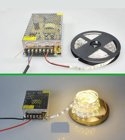 Close-up of flexible white LED light strip with 5050 SMD chips, showing cut points and adhesive backing.