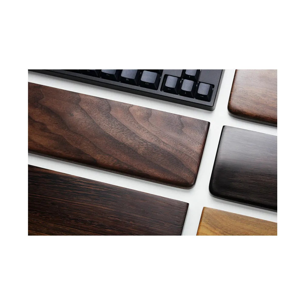 Solid black walnut wood mechanical keyboard hand rest measuring 300mm long for 60% keyboards