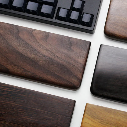 Solid black walnut wood mechanical keyboard hand rest measuring 300mm long for 60% keyboards