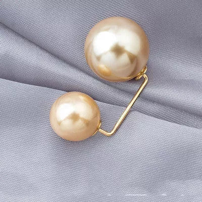 Copper anti-light brooch with pearl detail for skirt waist, Korean-style bow tie design