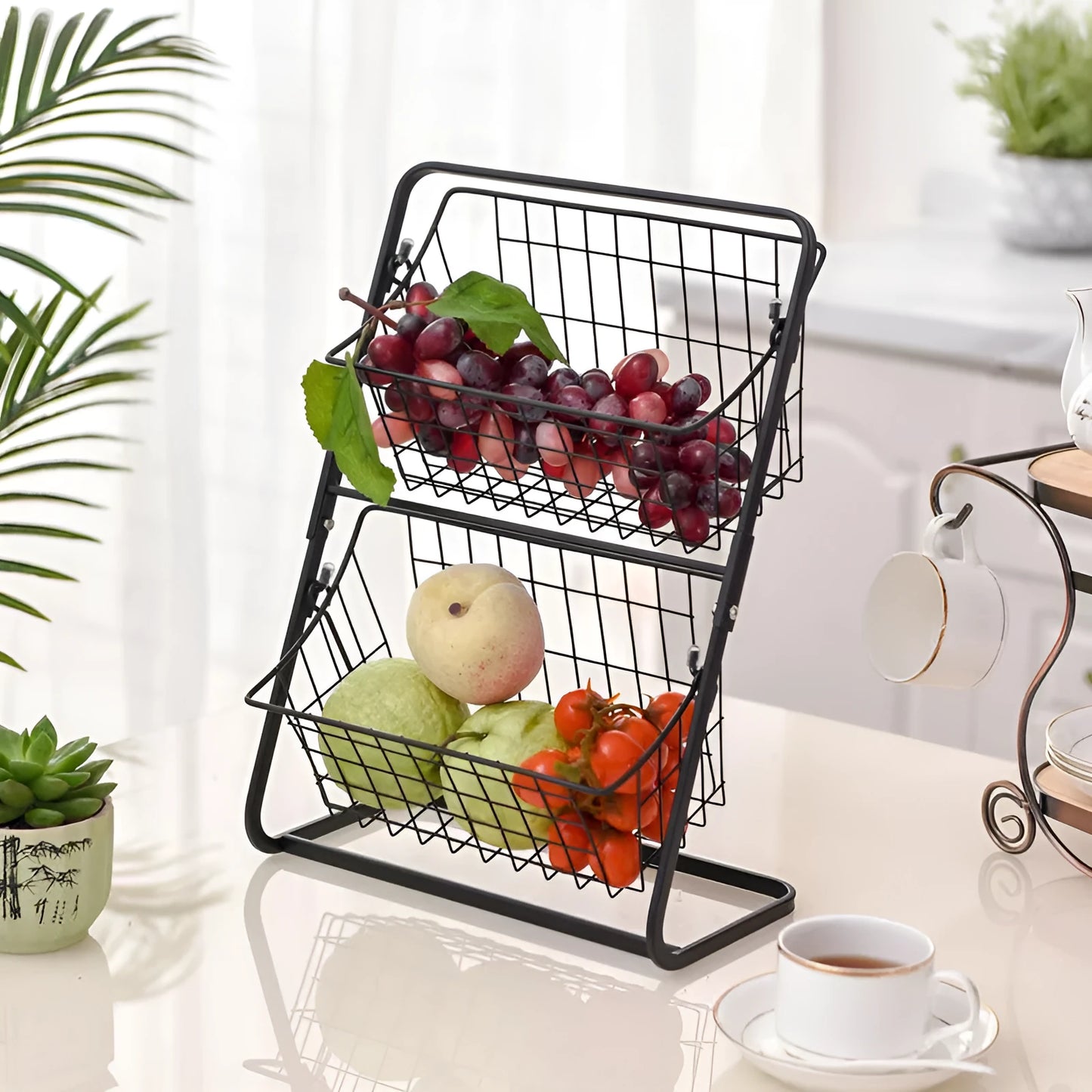 Stainless steel two-tier kitchen storage rack with hollowed design for air circulation around produce