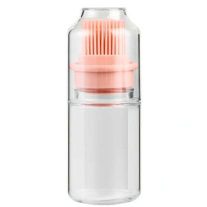 Pink portable oil bottle with silicone brush for baking and barbecue cooking with dust cover