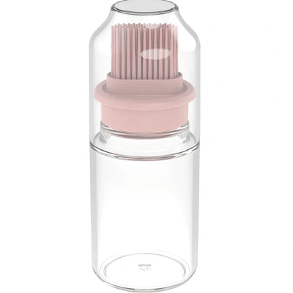 Pink portable oil bottle with silicone brush for baking and barbecue cooking with dust cover