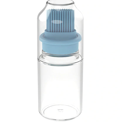 Pink portable oil bottle with silicone brush for baking and barbecue cooking with dust cover