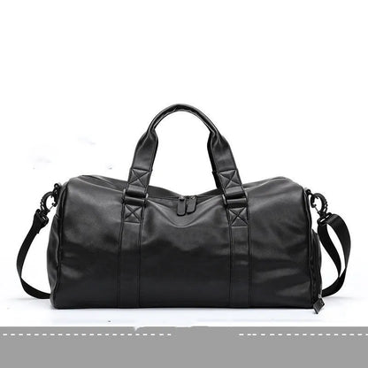 Large black waterproof PU leather sports duffel bag with multiple pockets, shown with a laptop and camera stored in its padded compartments.