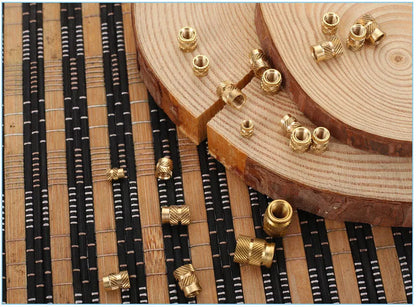 Brass hot melt copper nuts showing M2 and M3 thread sizes with measurement indicators