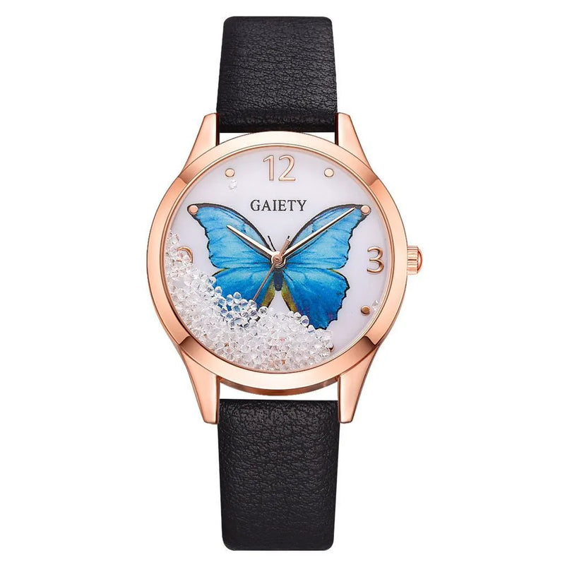 Gaiety brand ladies wristwatch with removable rhinestone butterfly decoration, quartz movement round dial dress watch in alloy case with black leather strap available in dark blue, grey, pink, silver, and sky blue dial colour options