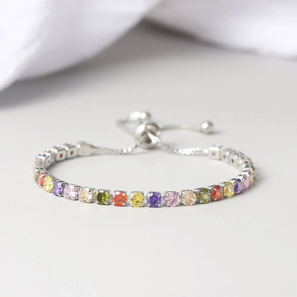 Elegant copper bracelet with sparkling zircon stones in various colours