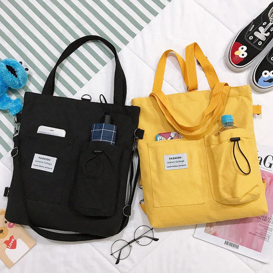 Stylish Harajuku-inspired canvas backpack with pockets, available in a variety of vibrant colors