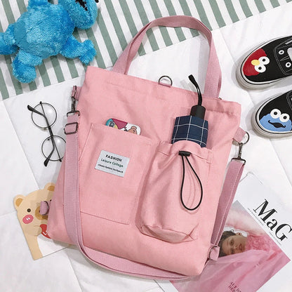 Stylish Harajuku-inspired canvas backpack with pockets, available in a variety of vibrant colors