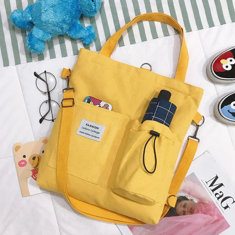 Stylish Harajuku-inspired canvas backpack with pockets, available in a variety of vibrant colors