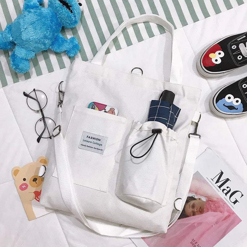 Stylish Harajuku-inspired canvas backpack with pockets, available in a variety of vibrant colors