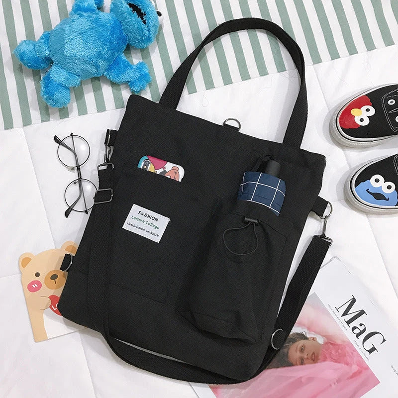 Stylish Harajuku-inspired canvas backpack with pockets, available in a variety of vibrant colors