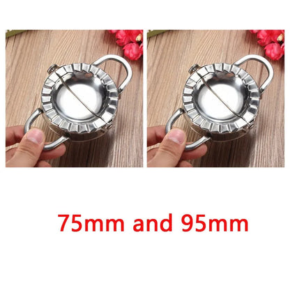 Stainless steel dumpling mould and rectangular dough cutter on a kitchen surface.