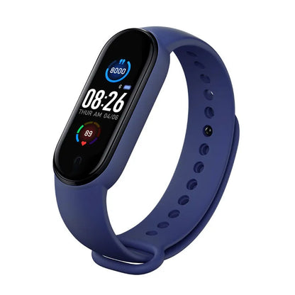 M5 smart bracelet in black on a wrist, showing the 0.96-inch touch screen displaying heart rate data.