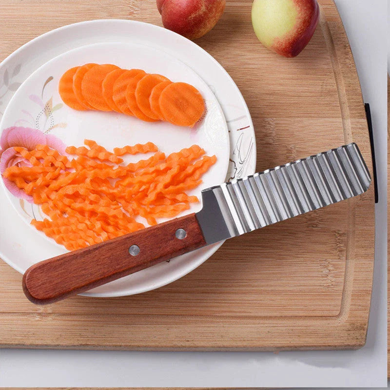 Stainless steel potato cutter with wave-style blade for creating professional-looking chips, vegetable slices, and fruit displays