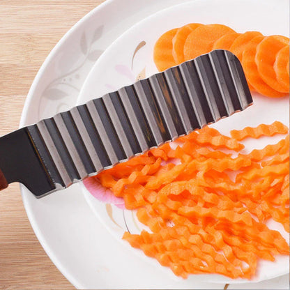 Stainless steel potato cutter with wave-style blade for creating professional-looking chips, vegetable slices, and fruit displays