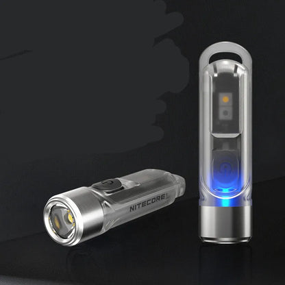 Green Nitecore TIKI mini portable USB rechargeable light with keychain.