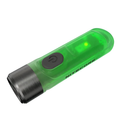 Green Nitecore TIKI mini portable USB rechargeable light with keychain.