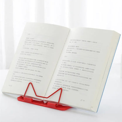 Red, green, and blue reading frame measuring 16x17.5cm made from metal and plastic materials