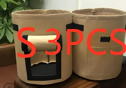 Black non-woven plant growth bag with side window and handles for potato gardening, breathable fabric, large size shown