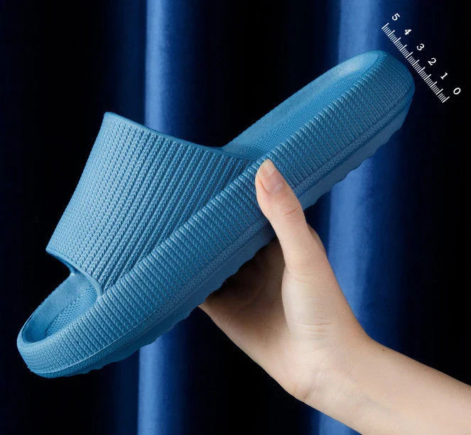 Cozy slip-on slippers in various colors for men and women, featuring soft fabric upper and non-slip EVA soles