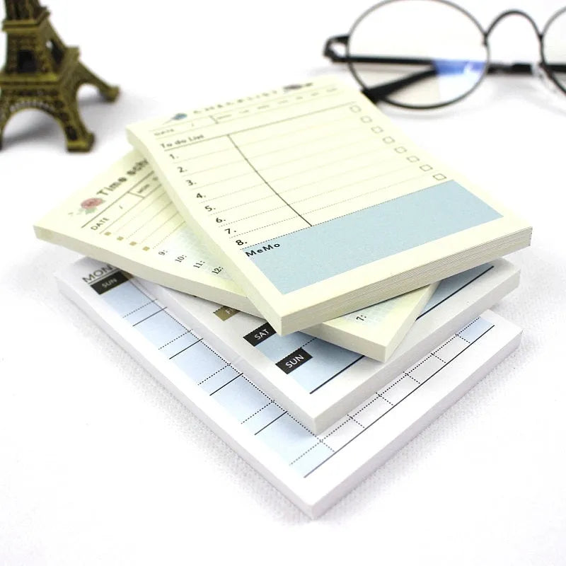 Compact weekly monthly work plan diary notebook showing four different design options