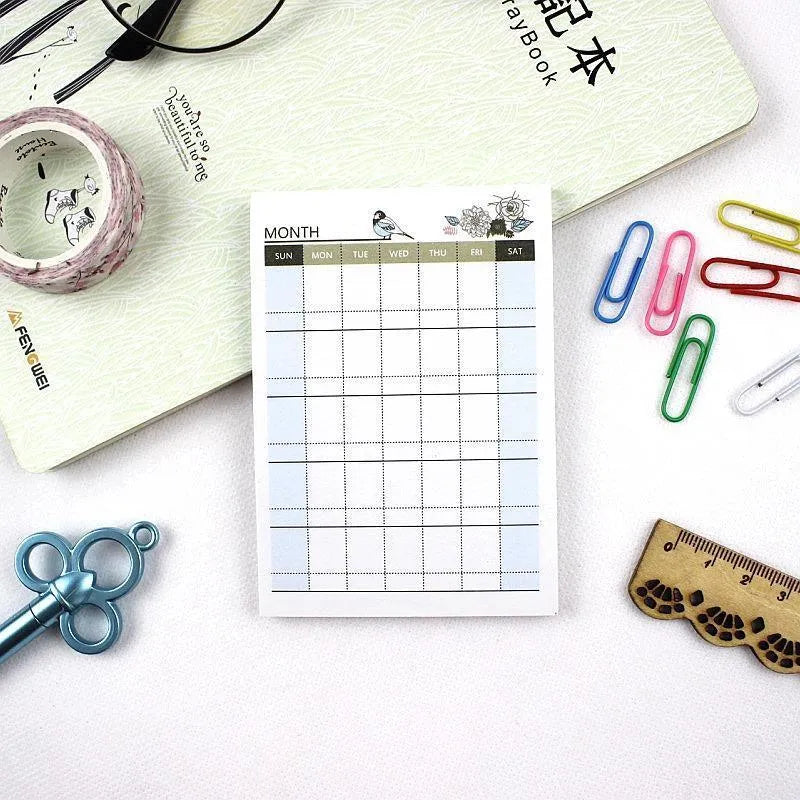 Compact weekly monthly work plan diary notebook showing four different design options