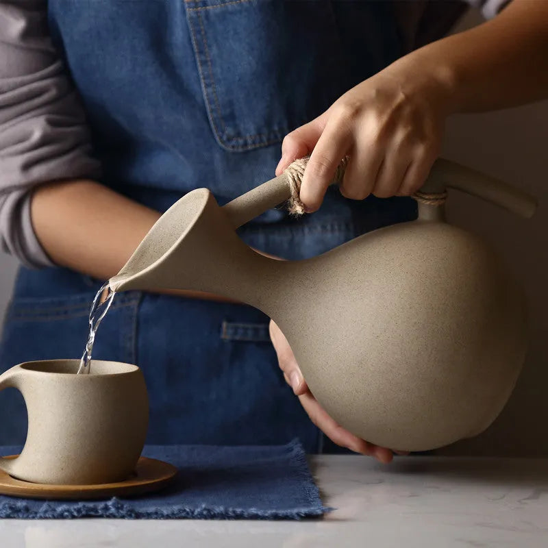 Ceramic cold kettle gift set with bone china pot, four cups, and bamboo serving tray