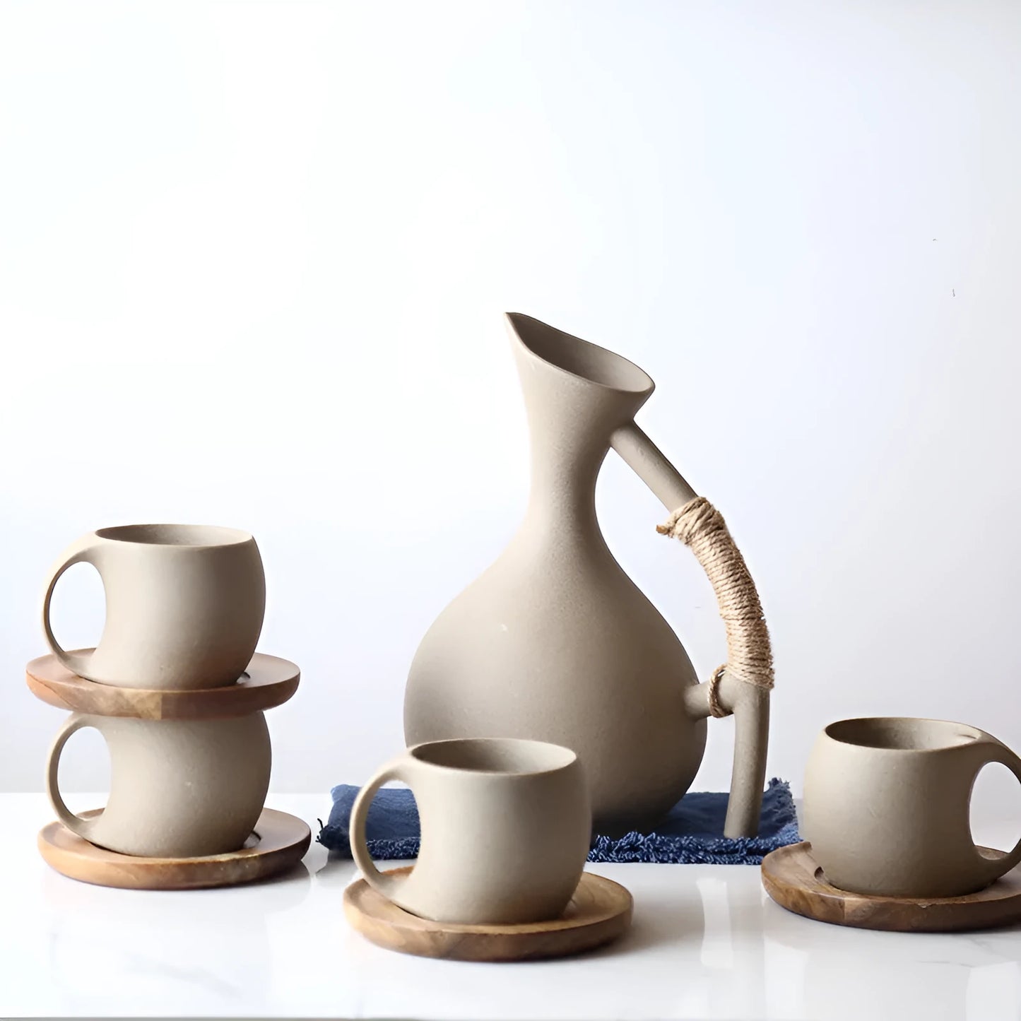 Ceramic cold kettle gift set with bone china pot, four cups, and bamboo serving tray