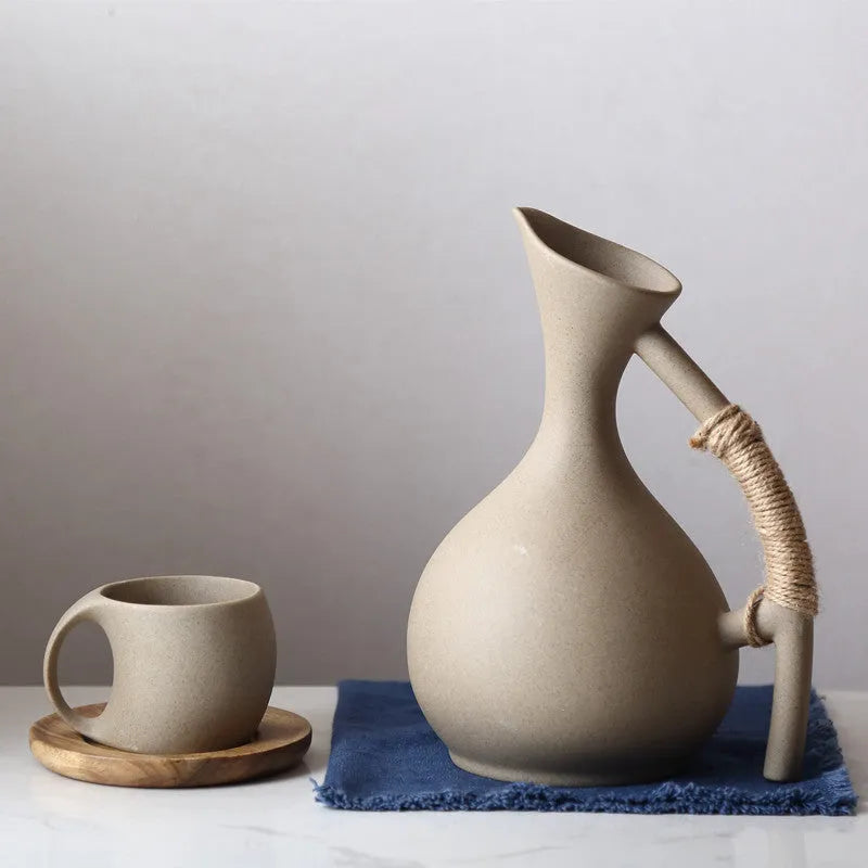 Ceramic cold kettle gift set with bone china pot, four cups, and bamboo serving tray