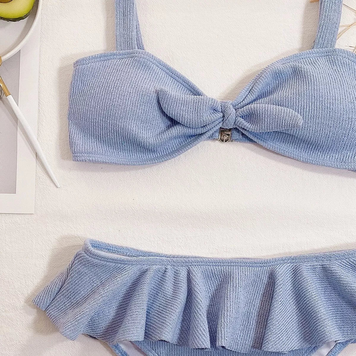 Ladies blue ruffle knitted fabric bikini with nylon blend for swimming